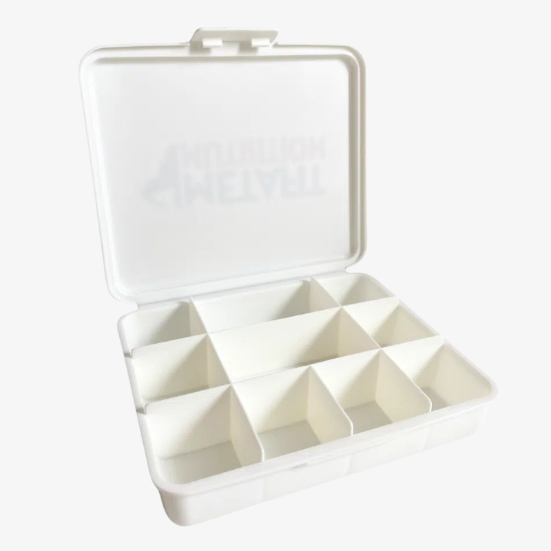 pilulier ouvert compartiments rangement gelules comprimes organisation complements alimentaires